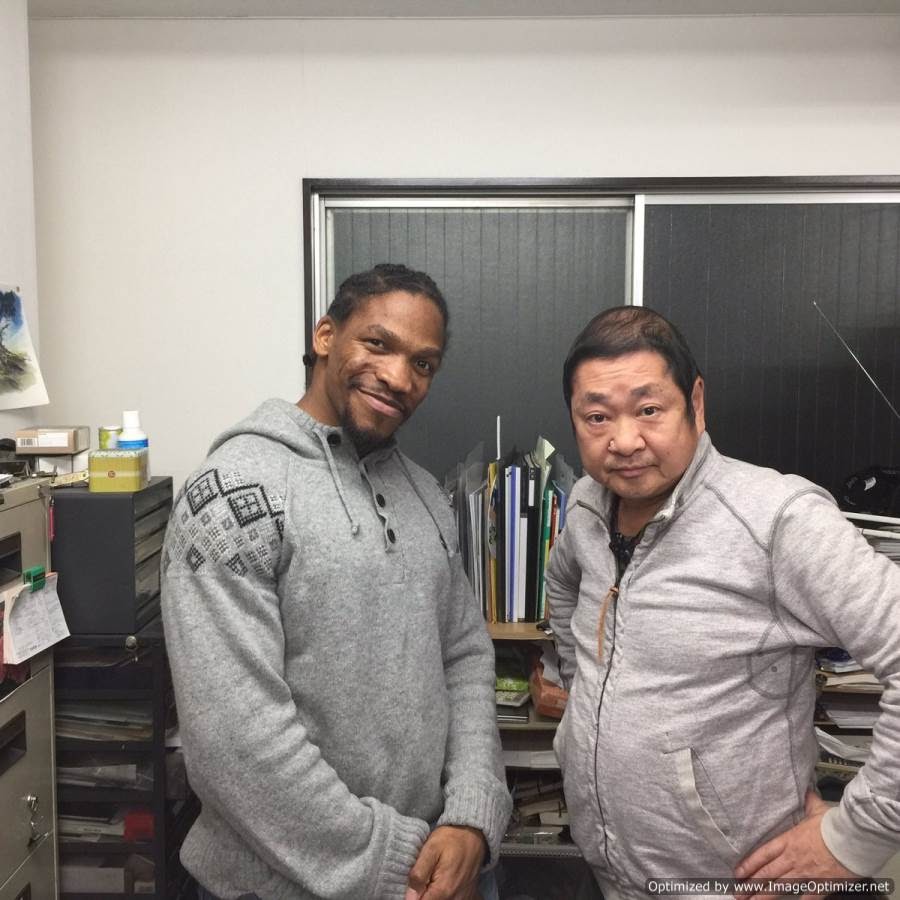 Arthell Isom and Hiromasa Ogura standing next to each other.