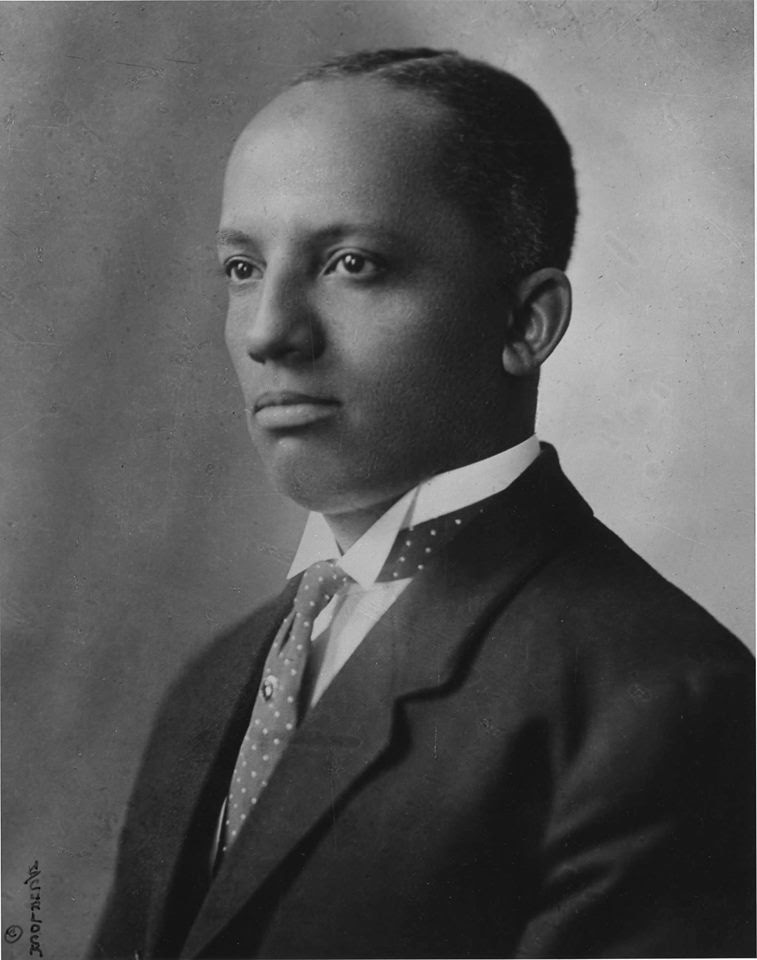 A side-view picture of Dr. Carter Woodson, founder of Negro History week