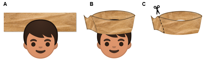 Long brown paper wrapped around the head of a boy to make the base of the crown.