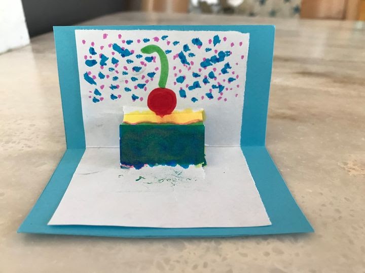Cake slice with cherry on top pop up card