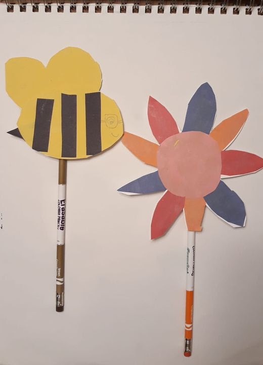 bee and flower collage attached to a pencil