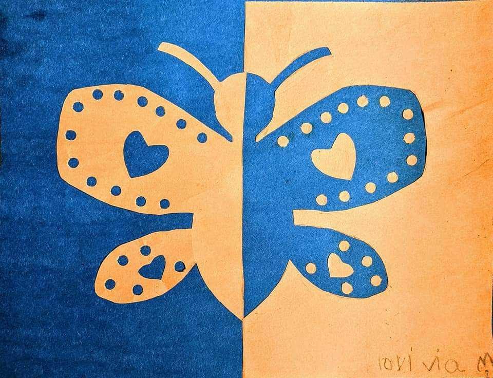 Blue and yellow butterfly art with small circles and hearts