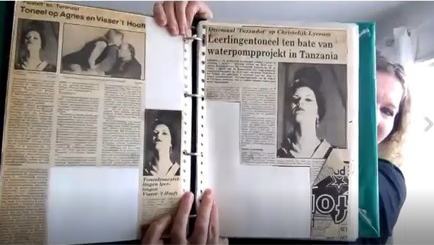 Maria van Lieshout holding a newspaper article
