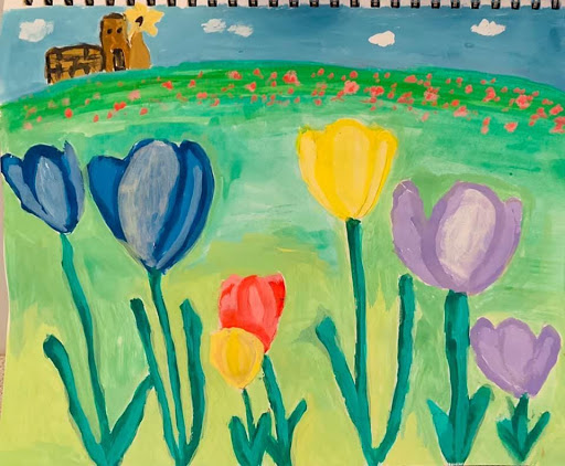 A bunch of tulip painting in a grassy area