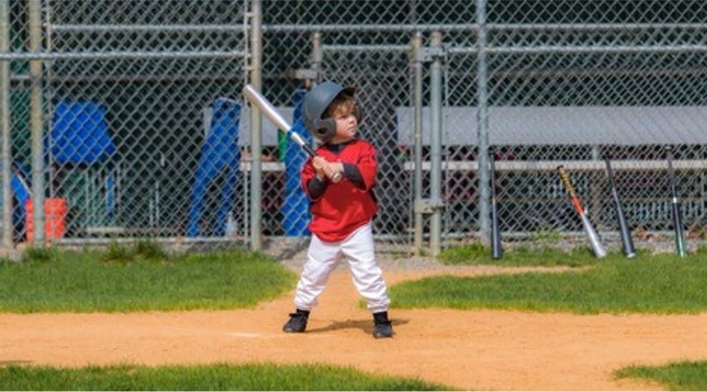 Young boy in a baseball field
